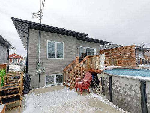 Back facade - 8815  - 8817 Rue M.-J.-Drapeau, Mirabel, QC - Outdoor With Above Ground Pool With Exterior