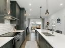 Kitchen - 8815  - 8817 Rue M.-J.-Drapeau, Mirabel, QC  - Indoor Photo Showing Kitchen With Double Sink With Upgraded Kitchen 