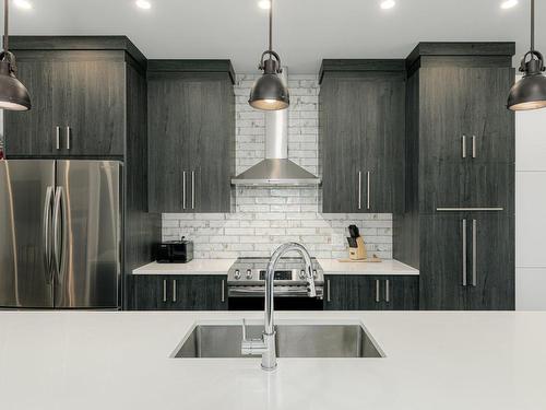 Kitchen - 8815  - 8817 Rue M.-J.-Drapeau, Mirabel, QC - Indoor Photo Showing Kitchen With Upgraded Kitchen