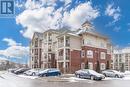 211 - 84 Aspen Springs Drive, Clarington, ON  - Outdoor With Balcony With Facade 