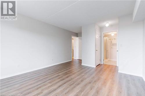 Spare room with light wood-type flooring - 870 Upper Wentworth Street Unit# 202, Hamilton, ON - Indoor Photo Showing Other Room