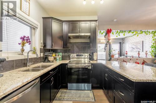 4625 James Hill Road, Regina, SK - Indoor Photo Showing Kitchen With Double Sink With Upgraded Kitchen