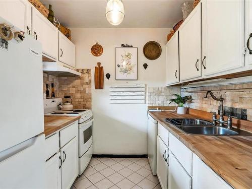 583-A-4678 Elk Lake Dr, Saanich, BC - Indoor Photo Showing Kitchen With Double Sink