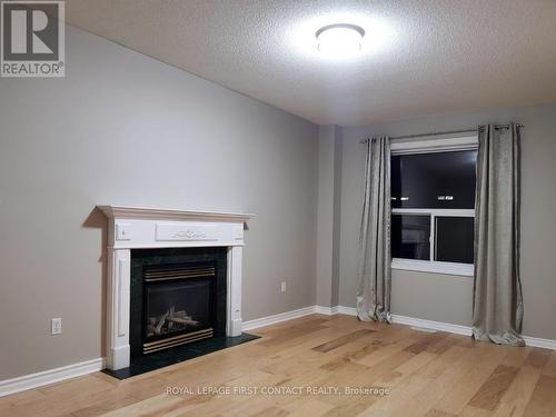 44 Livia Herman Way, Barrie, ON - Indoor Photo Showing Living Room With Fireplace