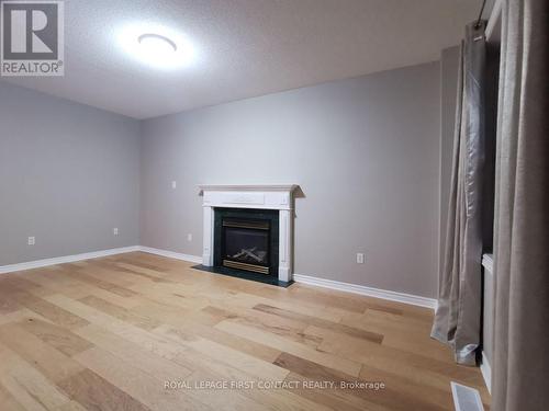 44 Livia Herman Way, Barrie, ON - Indoor Photo Showing Living Room With Fireplace