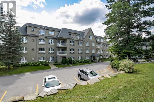 401 - 31 Dairy Lane, Huntsville (Chaffey), ON - Outdoor With Balcony With Facade