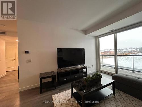 208 - 7549 Kalar Road, Niagara Falls, ON - Indoor Photo Showing Living Room