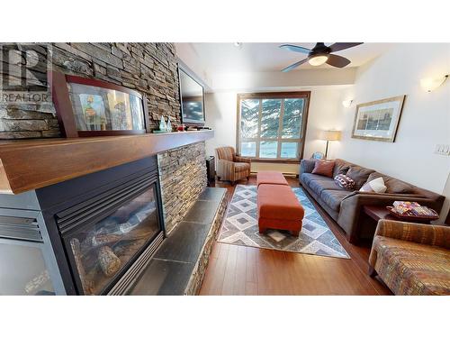 7495 Columbia Avenue Unit# 1101, Radium Hot Springs, BC - Indoor Photo Showing Living Room With Fireplace