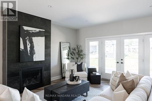 63 Homestead Drive, Niagara-On-The-Lake (108 - Virgil), ON - Indoor Photo Showing Living Room With Fireplace