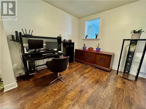 Office featuring dark wood-type flooring - 21 Minto Avenue, Hamilton, ON - Indoor