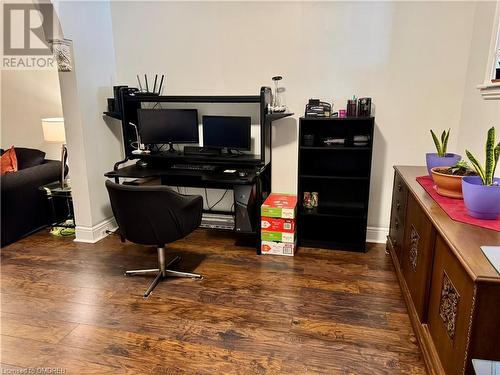 Office space featuring dark hardwood / wood-style flooring - 21 Minto Avenue, Hamilton, ON - Indoor Photo Showing Office