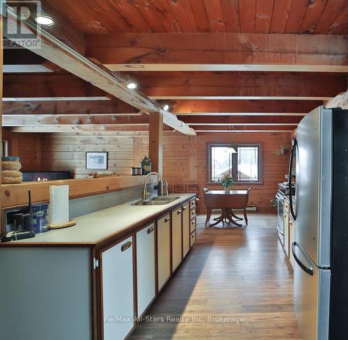 1058 Algonquin Outfitters Road, Algonquin Highlands, ON - Indoor Photo Showing Kitchen With Double Sink