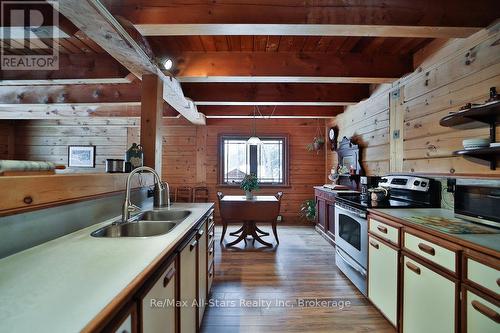 1058 Algonquin Outfitters Road, Algonquin Highlands, ON - Indoor Photo Showing Kitchen With Double Sink