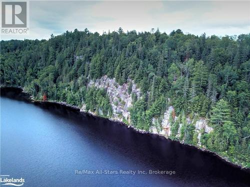 1058 Algonquin Outfitters Road, Algonquin Highlands, ON - Outdoor With Body Of Water With View