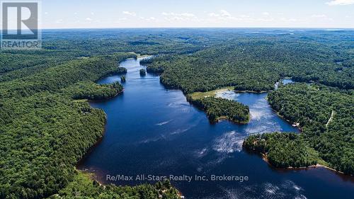 1058 Algonquin Outfitters Road, Algonquin Highlands, ON - Outdoor With Body Of Water With View