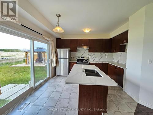 20 Sandhill Crane Drive, Wasaga Beach, ON - Indoor Photo Showing Kitchen With Double Sink