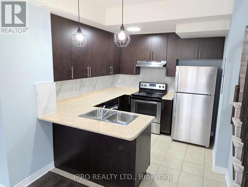 #31-03 - 2420 Baronwood Drive, Oakville, ON - Indoor Photo Showing Kitchen With Stainless Steel Kitchen With Double Sink