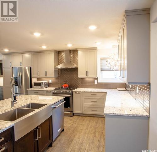 315 Emmeline Road, Saskatoon, SK - Indoor Photo Showing Kitchen With Double Sink With Upgraded Kitchen