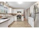 1911 Cross Road, Kelowna, BC  - Indoor Photo Showing Kitchen With Double Sink 