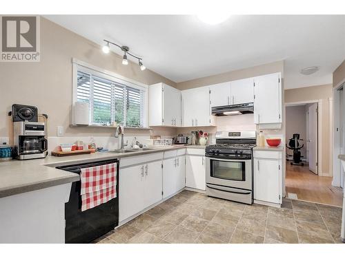 1911 Cross Road, Kelowna, BC - Indoor Photo Showing Kitchen With Double Sink