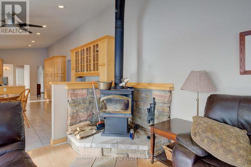 105 Taber Hill Lane W, Rideau Lakes, ON - Indoor Photo Showing Living Room With Fireplace