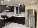 Bsmnt - 29 Coronation Circle, Brampton, ON  - Indoor Photo Showing Kitchen With Double Sink 