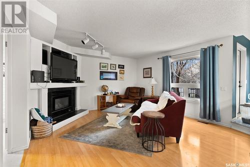 5508 Chester Place, Regina, SK - Indoor Photo Showing Living Room With Fireplace