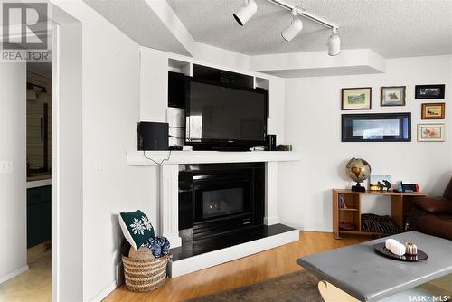 5508 Chester Place, Regina, SK - Indoor Photo Showing Living Room With Fireplace