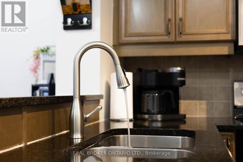 515 - 9225 Jane Street, Vaughan, ON - Indoor Photo Showing Kitchen With Double Sink