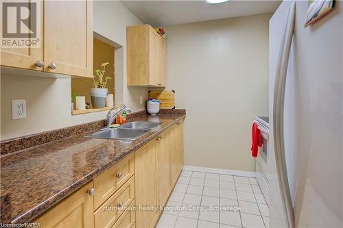 107 - 573 Armstrong Road, Kingston (East Gardiners Rd), ON - Indoor Photo Showing Kitchen With Double Sink