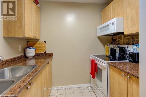 107 - 573 Armstrong Road, Kingston (East Gardiners Rd), ON - Indoor Photo Showing Kitchen With Double Sink