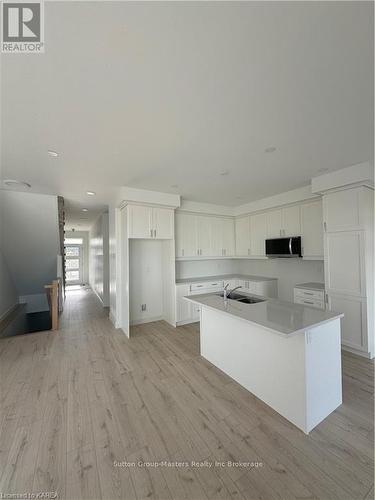 226 Dr Richard James Crescent, Loyalist (Amherstview), ON - Indoor Photo Showing Kitchen With Double Sink