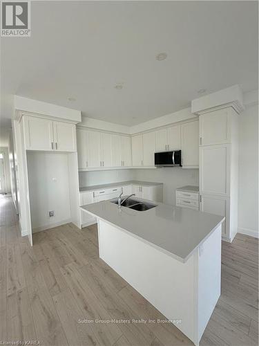 226 Dr Richard James Crescent, Loyalist (Amherstview), ON - Indoor Photo Showing Kitchen With Double Sink