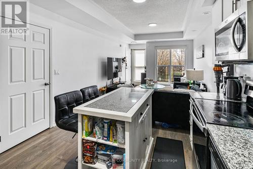 219 - 510 Kingbird Grove, Toronto, ON - Indoor Photo Showing Kitchen