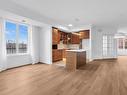 Dining room - 211-5730 Boul. Marie-Victorin, Brossard, QC  - Indoor Photo Showing Kitchen 