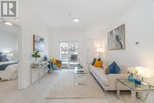 111 - 1360 Costigan Road, Milton, ON - Indoor Photo Showing Living Room