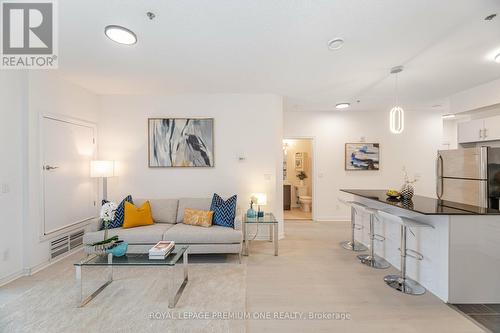 111 - 1360 Costigan Road, Milton, ON - Indoor Photo Showing Living Room