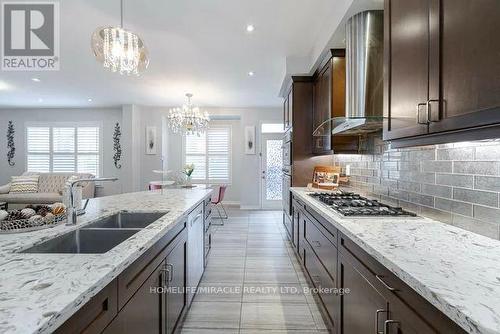 389 Etheridge Avenue, Milton, ON - Indoor Photo Showing Kitchen With Double Sink With Upgraded Kitchen