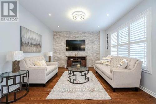 389 Etheridge Avenue, Milton, ON - Indoor Photo Showing Living Room With Fireplace