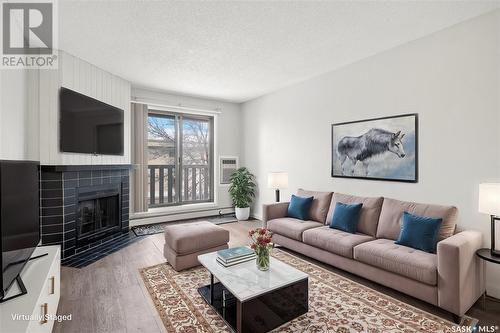 431 310 Stillwater Drive, Saskatoon, SK - Indoor Photo Showing Living Room With Fireplace