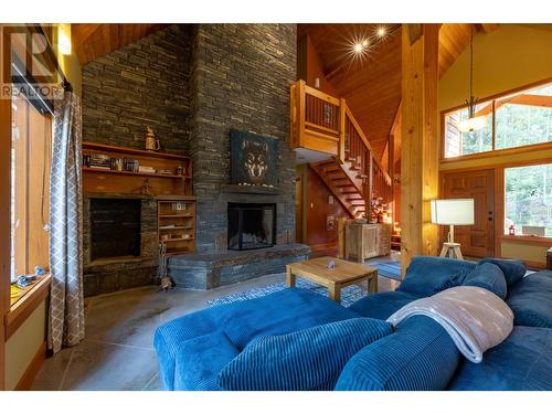 1438 Black Bear Drive, Golden, BC - Indoor Photo Showing Living Room With Fireplace