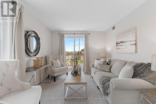 2 - 74 Petra Way, Whitby, ON - Indoor Photo Showing Living Room