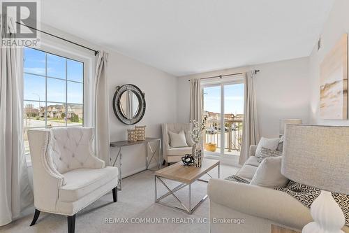 2 - 74 Petra Way, Whitby, ON - Indoor Photo Showing Living Room