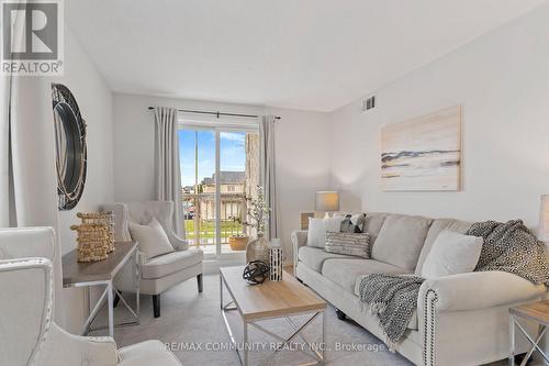 2 - 74 Petra Way, Whitby, ON - Indoor Photo Showing Living Room