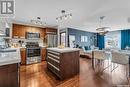 313 120 Phelps Way, Saskatoon, SK  - Indoor Photo Showing Kitchen With Stainless Steel Kitchen 