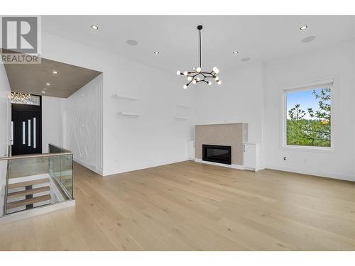 2302 Lavetta Drive, Kelowna, BC - Indoor Photo Showing Living Room With Fireplace