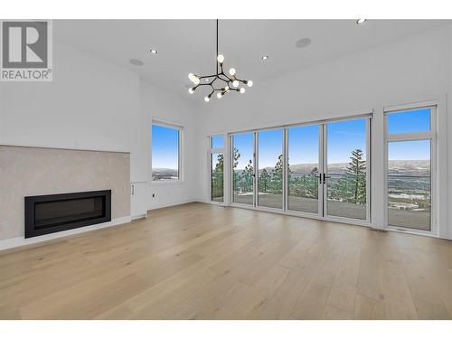 2302 Lavetta Drive, Kelowna, BC - Indoor Photo Showing Living Room With Fireplace