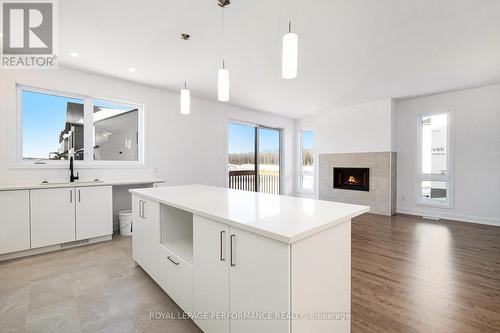 264 Bourdeau Boulevard, The Nation, ON - Indoor Photo Showing Other Room With Fireplace