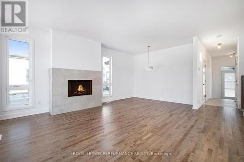 264 Bourdeau Boulevard, The Nation, ON - Indoor Photo Showing Living Room With Fireplace