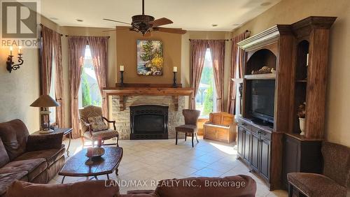 1632 County Rd 11, Stone Mills, ON - Indoor Photo Showing Living Room With Fireplace